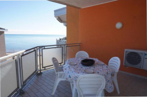 Stunning Apartment with Sea View Beachfront in Porto Santa Margherita, Porto Santa Margherita